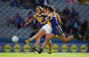 25 September 2016; Clare Timoney of Antrim scores her side's first goal despite the best efforts of Jacinta Brady, left, and Claire Farrell of Longford during the TG4 Ladies Football All-Ireland Junior Football Championship Final match between Antrim and Longford at Croke Park in Dublin.  Photo by Brendan Moran/Sportsfile