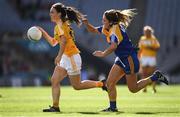 25 September 2016; Áine Devlin of Antrim in action against Sinéad Hughes of Longford during the TG4 Ladies Football All-Ireland Junior Football Championship Final match between Antrim and Longford at Croke Park in Dublin.  Photo by Brendan Moran/Sportsfile