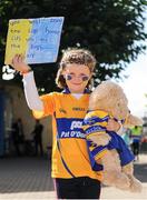 25 September 2016; Grace Fennell, age 6, from Kilrush, Co. Clare, holds up a banner in supporter of her team ahead of the TG4 Ladies Football All-Ireland Intermediate Football Championship Final match between Clare and Kildare at Croke Park in Dublin.  Photo by Seb Daly/Sportsfile