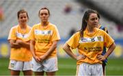 25 September 2016; Dejected Antrim players, from left, Jenny McCavana, Eimear Gallagher and Áine Devlin after the TG4 Ladies Football All-Ireland Junior Football Championship Final match between Antrim and Longford at Croke Park in Dublin.  Photo by Brendan Moran/Sportsfile