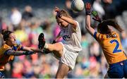 25 September 2016; Maria Moolick of Kildare scores a point, while under pressure from Ellie O'Gorman, left, and Kayleigh McCormack of Clare during the TG4 Ladies Football All-Ireland Intermediate Football Championship Final match between Clare and Kildare at Croke Park in Dublin.  Photo by Seb Daly/Sportsfile