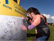 25 September 2016; Emily Mockler, ager 9 from Newbridge, Co.Galway signs the congratulation board during the Aviva FAI Club of the Year Community Day with Shiven Rovers at Newbridge in Co. Galway Photo by David Maher/Sportsfile