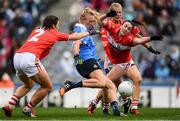 25 September 2016; Carla Rowe of Dublin has her shot blocked down by Marie Ambrose and Shauna Kelly, right, of Cork during the Ladies Football All-Ireland Senior Football Championship Final match between Cork and Dublin at Croke Park in Dublin. Photo by Brendan Moran/Sportsfile
