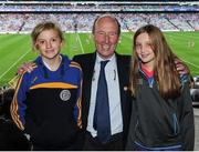 25 September 2016; Shane Ross, Minister for Transport, Tourism and Sport, with niece Millie Webb, right, age 11, and Freya Fitzpatrick-O'Doherty, left, age 11, during the Ladies Football All-Ireland Senior Football Championship Final match between Cork and Dublin at Croke Park in Dublin.  Photo by Seb Daly/Sportsfile