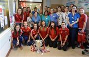 26 September 2016; Members of the Cork team and nursing staff with the Brendan Martin cup during a visit to Our Lady's Children's Hospital, Crumlin, in Dublin. Photo by Piaras Ó Mídheach/Sportsfile