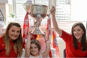 26 September 2016; Ciara Ashman, age 10, and member of Inch Rovers GAA club in Cork, with Cork players Annie Walsh, left, and Ciara O'Sullivan with the Brendan Martin cup during a visit to Our Lady's Children's Hospital, Crumlin, in Dublin. Photo by Piaras Ó Mídheach/Sportsfile