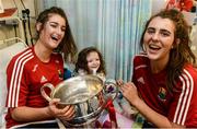 26 September 2016; Áine McInerney, age 4, from Mountainpole, Kells, in Meath, and Cork players Eimear Meaney, left, and Maeve O'Sullivan with the Brendan Martin cup during a visit to Temple Street Children's Hospital, in Dublin. Photo by Piaras Ó Mídheach/Sportsfile