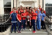 26 September 2016; Cork players and their manager Ephie Fitzgerald with nursing staff and the Brendan Martin cup during a visit to Temple Street Children's Hospital, in Dublin. Photo by Piaras Ó Mídheach/Sportsfile