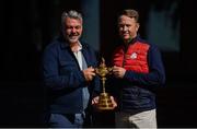26 September 2016; Europe team captain Darren Clarke, left, and USA captain Davis Love III with the Ryder Cup on their arrival ahead of The 2016 Ryder Cup Matches at the Hazeltine National Golf Club in Chaska, Minnesota, USA. Photo by Ramsey Cardy/Sportsfile Photo by Ramsey Cardy/Sportsfile