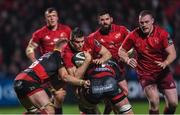 3 November 2017; Chris Farrell of Munster is tackled by Aaron Wainwright, left and James Benjamin of Dragons during the Guinness PRO14 Round 8 match between Munster and Dragons at Irish Independent Park in Cork. Photo by Eóin Noonan/Sportsfile