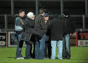 29 January 2011; Derry manager John Brennan is interviewed by journalists on the field after the game. Barrett Sports Lighting Dr. McKenna Cup Semi-Final, Derry v Antrim, Celtic Park, Derry. Picture credit: Oliver McVeigh / SPORTSFILE