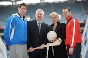 2 February 2011; The GAA have announced 'Playing for Life' as one of the Association's official charities for 2011. The Association welcomes the partnership between the two organisations and will work with Playing for Life to further highlight the excellent work among GAA members and Clubs that the charity has overseen in Africa since it's inception. 'Playing for Life' was established by RTE sports presenter Tracy Piggott and has worked with Tanzania, Kenya, and Malawi since 2005 focusing on the teaching and training of skills and trades and also self - sustainability through education. At the launch is founder of Playing for Life Tracy Piggott and Uachtarán Cumann Lúthchleas Gael Criostóir Ó Cuana, with Dublin footballer Éamon Fennell, left, and Tyrone footballer Martin Penrose. Croke Park, Dublin. Picture credit: Brian Lawless / SPORTSFILE