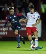27 September 2016; Jamie McGrath of St Patrick's Athletic in action against Mick Leahy of Sligo Rovers during the SSE Airtricity League Premier Division match between St Patrick's Athletic and Sligo Rovers at Richmond Park in Dublin. Photo by Matt Browne/Sportsfile