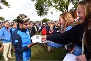 27 September 2016; One Direction singer Niall Horan signs autographs for fans before his round of the Celebrity Matches at The 2016 Ryder Cup Matches at the Hazeltine National Golf Club in Chaska, Minnesota, USA. Photo by Ramsey Cardy/Sportsfile