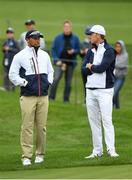 28 September 2016; USA vice-captain Tiger Woods in conversation with Jordan Spieth during a practice round ahead of The 2016 Ryder Cup Matches at the Hazeltine National Golf Club in Chaska, Minnesota, USA.