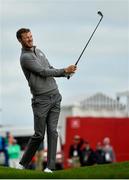 28 September 2016; Chris Wood of Europe watches his second shot on the on the 11th fairway during a practice round ahead of The 2016 Ryder Cup Matches at the Hazeltine National Golf Club in Chaska, Minnesota, USA.