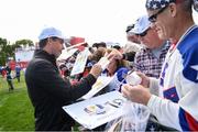 29 September 2016; Europe vice-captain Padraig Harrington signs autographs after the a practice session ahead of The 2016 Ryder Cup Matches at the Hazeltine National Golf Club in Chaska, Minnesota, USA. Photo by Ramsey Cardy/Sportsfile