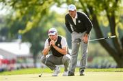 29 September 2016; Justin Rose, left, and Henrik Stenson of Europe study a putt on the ninth green during a practice session ahead of The 2016 Ryder Cup Matches at the Hazeltine National Golf Club in Chaska, Minnesota, USA. Photo by Ramsey Cardy/Sportsfile