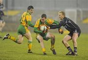 5 February 2011; Martin McElhinney, Donegal, in action against Paul McGovern, Sligo. Allianz Football League Division 2 Round 1, Donegal v Sligo, MacCumhaill Park, Ballybofey, Co. Donegal. Picture credit: Oliver McVeigh / SPORTSFILE