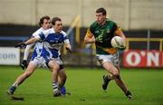 6 February 2011; Shane O'Rourke, Meath, in action against Niall Donoher, and Padraig McMahon, far left, Laois. Allianz Football League Division 2 Round 1, Laois v Meath, O'Moore Park, Portlaoise. Picture credit: Barry Cregg / SPORTSFILE