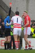 6 February 2011; Noel O'Leary, Cork, right, is issued a red card by referee Michael Duffy, Sligo. Allianz Football League Division 1 Round 1, Kerry v Cork, Austin Stack Park, Tralee, Co. Kerry. Picture credit: Stephen McCarthy / SPORTSFILE