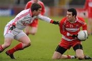 6 February 2011; Caolan O'Boyle, Derry, in action against Dermot Carlin, Tyrone. Allianz Football League Division 2 Round 1, Derry v Tyrone, Celtic Park, Derry. Picture credit: Oliver McVeigh  / SPORTSFILE