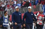 30 September 2016; Henrik Stenson, left and Justin Rose of Europe after the first tee shot during the morning Foursomes Matches against Jordan Spieth and Patrick Reed of USA at The 2016 Ryder Cup Matches at the Hazeltine National Golf Club in Chaska, Minnesota, USA. Photo by Ramsey Cardy/Sportsfile