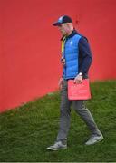 30 September 2016; Paul O'Connell makes his way to the first tee during the morning Foursomes Matches at The 2016 Ryder Cup Matches at the Hazeltine National Golf Club in Chaska, Minnesota, USA. Photo by Ramsey Cardy/Sportsfile