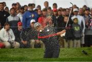 30 September 2016; Rickie Fowler of USA plays from a bunker on the 4th hole during the morning Foursomes Match against Rory McIlroy and Andy Sullivan of Europe at The 2016 Ryder Cup Matches at the Hazeltine National Golf Club in Chaska, Minnesota, USA. Photo by Ramsey Cardy/Sportsfile
