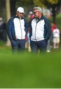30 September 2016; Europe team captain Darren Clarke, right, and vice-captain Padraig Harrington during the morning Foursomes Matches between Rory McIlroy and Andy Sullivan of Europe and Phil Mickelson and Rickie Fowler of USA at The 2016 Ryder Cup Matches at the Hazeltine National Golf Club in Chaska, Minnesota, USA. Photo by Ramsey Cardy/Sportsfile