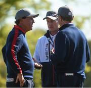 30 September 2016; Phil Mickelson, left, of USA with vice-captain Jim Furyk, centre, and captain Davis Love III after the morning Foursomes Match against Rory McIlroy and Andy Sullivan of Europe at The 2016 Ryder Cup Matches at the Hazeltine National Golf Club in Chaska, Minnesota, USA. Photo by Ramsey Cardy/Sportsfile