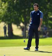 30 September 2016 Rory McIlroy of Europe reacts after missing a putt on the 2nd during the afternoon Fourball Match against Dustin Johnson and Matt Kuchar of USA at The 2016 Ryder Cup Matches at the Hazeltine National Golf Club in Chaska, Minnesota, USA. Photo by Ramsey Cardy/Sportsfile