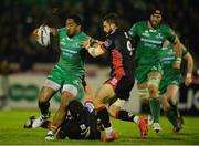 30 September 2016; Bundee Aki of Connacht is tackled by John Hardie and Sean Kennedy of Edinburgh, right, during the Guinness PRO12 Round 5 match between Connacht and Edinburgh Rugby at the Sportsground in Galway. Photo by Piaras Ó Mídheach/Sportsfile
