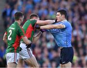 1 October 2016; Brendan Harrison and Donal Vaughan of Mayo, centre, tussle with Diarmuid Connolly of Dublin during the GAA Football All-Ireland Senior Championship Final Replay match between Dublin and Mayo at Croke Park in Dublin. Photo by Sportsfile