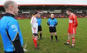 6 February 2011; Referee Martin Duffy speaks to Tyrone  captain Ryan McMenamin and Derry captain Barry McGoldrick, right, before the game. Allianz Football League Division 2 Round 1, Derry v Tyrone, Celtic Park, Derry. Picture credit: Oliver McVeigh  / SPORTSFILE