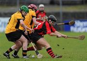 6 February 2011; Emma Moran, Oulart-the-Ballagh, in action against Karen Brien and Ann Marie Starr, left, Killimor. All-Ireland Senior Camogie Club Championship Semi-Final, Killimor v Oulart-the-Ballagh, Duggan Park, Ballinasloe, Co. Galway. Picture credit: Brian Lawless / SPORTSFILE