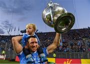 1 October 2016; Denis Bastick of Dublin celebrates with his son Aidan following the GAA Football All-Ireland Senior Championship Final Replay match between Dublin and Mayo at Croke Park in Dublin. Photo by Sportsfile