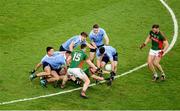 1 October 2016; Colm Boyle of Mayo attempts to get the ball away from Dublin players, left to right, Eric Lowndes, James McCarthy, Michael Fitzsimons, Brian Fenton, and Michael Darragh MacAuley during the GAA Football All-Ireland Senior Championship Final Replay match between Dublin and Mayo at Croke Park in Dublin. Photo by Daire Brennan/Sportsfile
