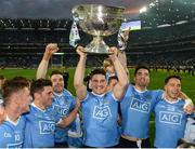 1 October 2016; Diarmuid Connolly of Dublin lifts the Sam Maguire cup alongside team-mates following the GAA Football All-Ireland Senior Championship Final Replay match between Dublin and Mayo at Croke Park in Dublin. Photo by Cody Glenn/Sportsfile