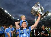 1 October 2016; Denis Bastick of Dublin and his son Aidan with the Sam Maguire Cup following the GAA Football All-Ireland Senior Championship Final Replay match between Dublin and Mayo at Croke Park in Dublin. Photo by Stephen McCarthy/Sportsfile