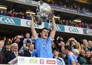 1 October 2016; Diarmuid Connolly of Dublin lifts the Sam Maguire Cup after the GAA Football All-Ireland Senior Championship Final Replay match between Dublin and Mayo at Croke Park in Dublin. Photo by Ray McManus/Sportsfile