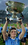 1 October 2016; Diarmuid Connolly of Dublin lifting the Sam Maguire Cup after the GAA Football All-Ireland Senior Championship Final Replay match between Dublin and Mayo at Croke Park in Dublin. Photo by Eóin Noonan/Sportsfile