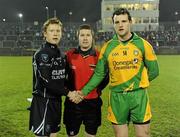 5 February 2011; Referee Padraig Hughes with Sligo captain Charlie Harison, left, and Donegal captain Michael Murphy before the coin toss. Allianz Football League Division 2 Round 1, Donegal v Sligo, MacCumhaill Park, Ballybofey, Co. Donegal. Picture credit: Oliver McVeigh / SPORTSFILE