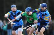 8 February 2011; Ciarán Cowan, Limerick IT, in action against Walter Walsh, left, and Kevin O'Loughlin, UCD. Ulster Bank Fitzgibbon Cup Group 2, UCD v Limerick IT, UCD, Belfield, Dublin. Picture credit: Dáire Brennan / SPORTSFILE