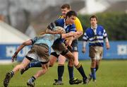 9 February 2011; Greg Jones, St. Andrew's, is tackled by Cathal McGetigan, St. Michael's. Powerade Leinster Schools Junior Cup, First Round, St. Andrew's v St. Michael's, Blackrock RFC, Stradbrook Road, Dublin. Picture credit: Barry Cregg / SPORTSFILE