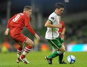 8 February 2011; Ciaran Clark, Republic of Ireland, in action against Simon Church, Wales. Carling Four Nations Tournament, Republic of Ireland v Wales, Aviva Stadium, Lansdowne Road, Dublin. Picture credit: Barry Cregg / SPORTSFILE
