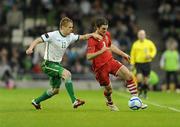 8 February 2011; Sam Ricketts, Wales, in action against Damien Duff, Republic of Ireland. Carling Four Nations Tournament, Republic of Ireland v Wales, Aviva Stadium, Lansdowne Road, Dublin. Picture credit: Barry Cregg / SPORTSFILE