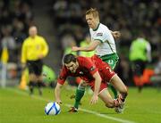 8 February 2011; Damien Duff, Republic of Ireland, fouls Sam Ricketts, Wales. Carling Four Nations Tournament, Republic of Ireland v Wales, Aviva Stadium, Lansdowne Road, Dublin. Picture credit: Barry Cregg / SPORTSFILE