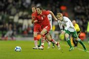 8 February 2011; Sam Ricketts, Wales, in action against Andy Keogh, Republic of Ireland. Carling Four Nations Tournament, Republic of Ireland v Wales, Aviva Stadium, Lansdowne Road, Dublin. Picture credit: Barry Cregg / SPORTSFILE