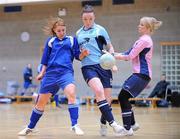 29 January 2011; Rebecca Walsh, DCU, in action against Louise Quinn, left, and Shona Hanlon UCD. Womens Soccer Colleges Association of Ireland National Futsal Finals, University of Limerick, Limerick. Picture credit: Diarmuid Greene / SPORTSFILE